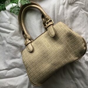 Mini gold handbag